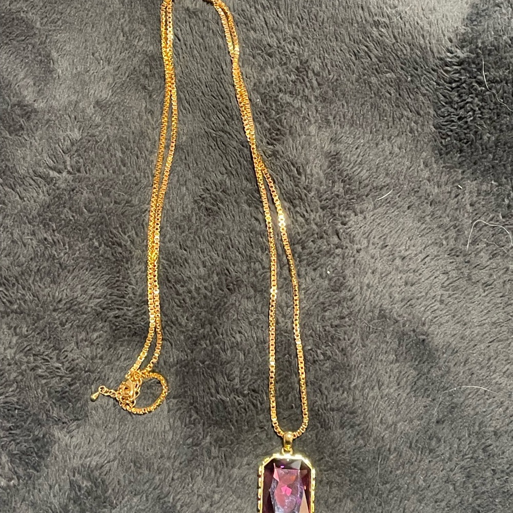 Elegant Gold Necklace with Purple Pendant